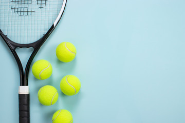 Tennis ball and racket isolated background. Top view - obrazy, fototapety, plakaty