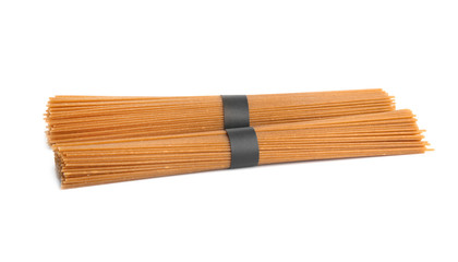 Uncooked buckwheat noodles isolated on white. Japanese cuisine