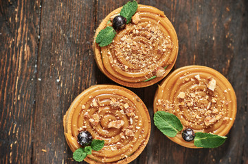 tart with salted caramel french dessert. Food industry, mass or volume production.