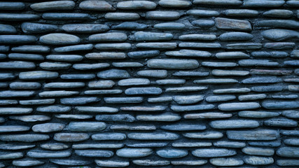 Peddle stone wall texture background