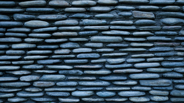Peddle stone wall texture background