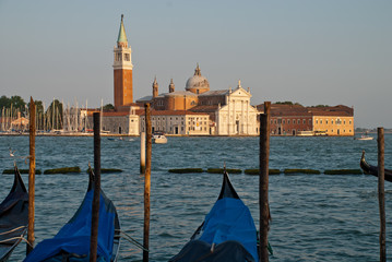 Venice, Italy: traditional Gondola on Giudecca Canal with San Giorgio Maggiore church in the background, San Marco