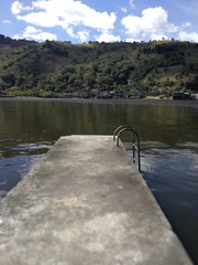dock view with mountains in the background