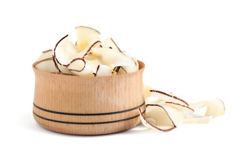 Tasty coconut chips in wooden bowl isolated on white