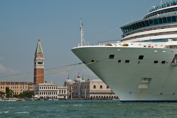 Venice, Italy: Cruise liner is moving in the lagoon of Venice. The Piazza of San Marco and...