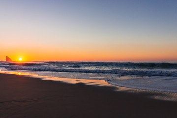 Fototapeta na wymiar Sunset on Adraga Beach, Power of Nature, Sintra, Portugal