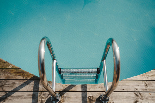 High angle view of ladder in swimming pool