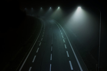 Fototapeta na wymiar Road with lights in dark night