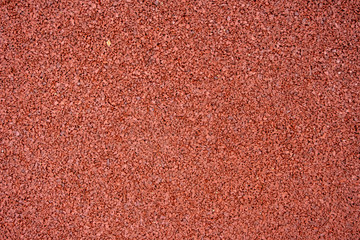 Fototapeta premium Surface structure of red rocks, close-up