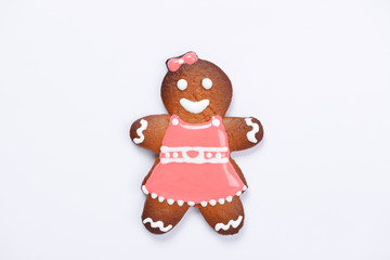 The hand-made eatable gingerbread little man on white background