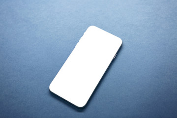 Frameless phone mockup on trendy classic blue background.