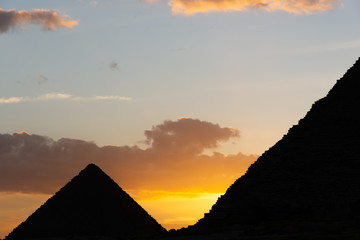 Fototapeta na wymiar Sunset behind Giza pyramids