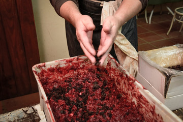 Handmade blood sausage preparation, Argentine tradition, Pampas, Patagonia