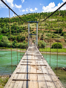 Old Bridge Over Black Drin River In Albania In Summer