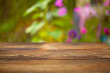 abstract background with wooden table and blurry background