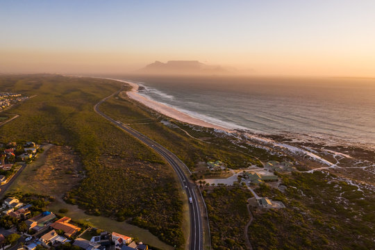 Aerial view of Little Bay beach during sunset, South Africa.