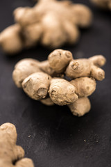 Portion of fresh Ginger (selective focus; close-up shot)