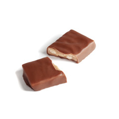 Chocolate bar broken into two halves on white