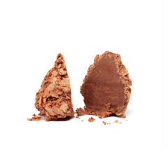 Chocolate nougat candy sprinkled with wafer crumbs and halved