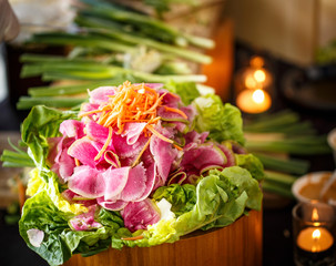 shaved beets, carrots and lettuces on display