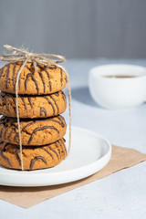  Oatmeal cookies on a gray wooden table.