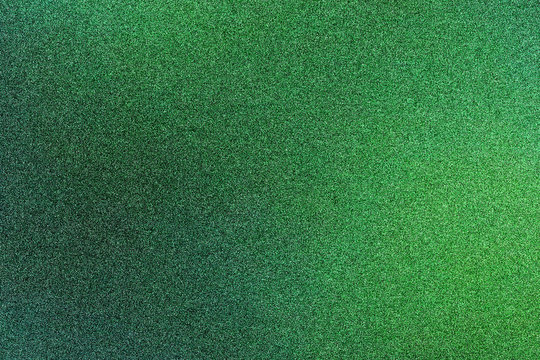 Abstrakter grüner Textur-Hintergrund, Bildrauschen und analoger Flimmer Effekt mit Pixeln und Struktur.