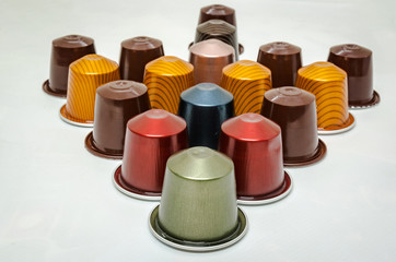colorful coffee capsules arranged in different forms