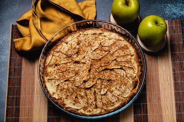 Sweet homemade apple cake with cinnamon. Top view