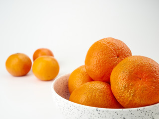Tangerines or orange Mandarin fruit and peeled slices. A bunch of oranges and half.
