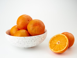 Tangerines or orange Mandarin fruit and peeled slices. A bunch of oranges and half.