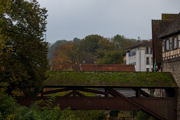 Fototapeta na wymiar Covered bridge over Kocher river in Schwäbisch Hall Germany