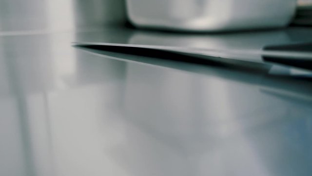 knife in the kitchen.knife on a metal table