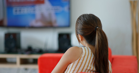 Woman watch tv at home