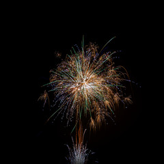 Fototapeta premium isolated multi colored event firework at night