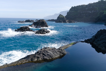 Fototapeta na wymiar Amazing nature landscape in Seixal, Madeira, Portugal, europe with natural lava rock swimming pool