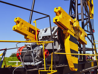 Balance weight and reducer the pumping unit of an oil well.