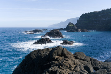 View of beautiful mountains and ocean on northern coast Madeira island, Portugal