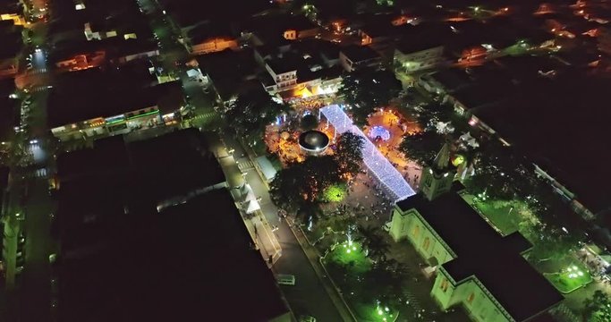 Aerial view during traditional dance performance called "Congada" or "Festa do Congo" in Itamogi, Minas Gerais, Brazil. 4K.