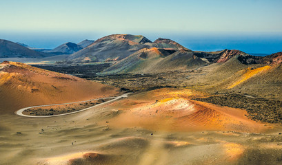beautiful postcard view of Montanas del fuego in Timanfaya National Park, Lanzarote, Canary Islands
