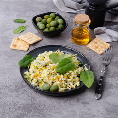 Vegetable salad with olives and spinach
