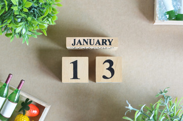 January 13, Background Design with number cube tray of fruit and wine in natural concept.