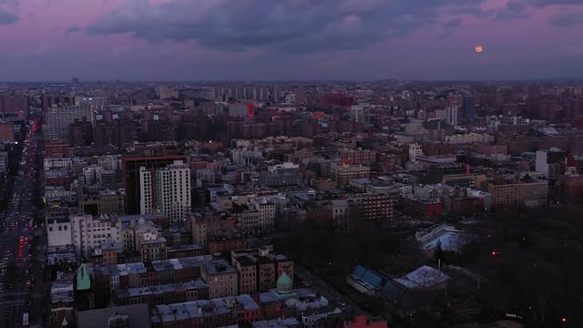 Gorgeous settling aerial footage over Harlem, NYC with the moon!  in 4k