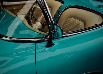 Vintage car interior.Teal and tan lather