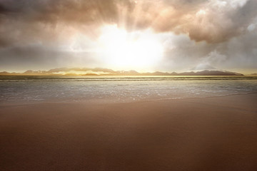 Sandy beach with mountain views