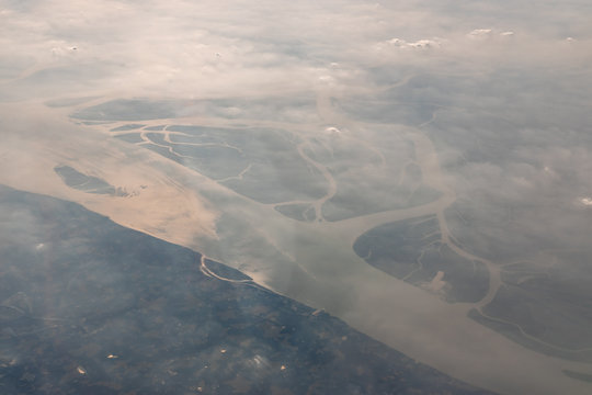 Aerial View of the magnificent Bramhaputra River in Bangladesh from the airplane. selective focus.