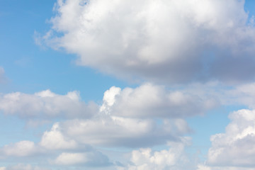 Clouds on a blue sky as a background