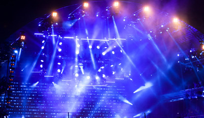 Blue light on a rock concert stage as background