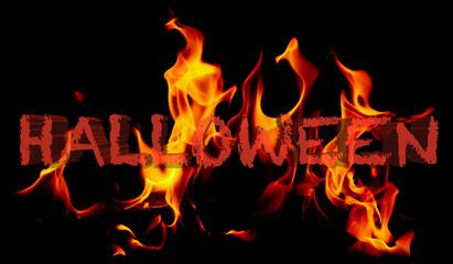 Halloween holiday on fire on a black background