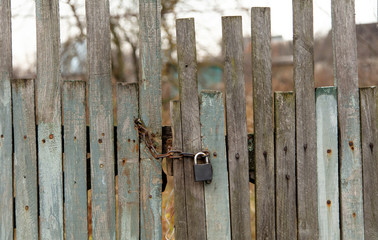 Old wooden boards on the fence as a background