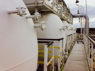 Oil separation unit. The primary separation stage and the final stage of separation in one physical...